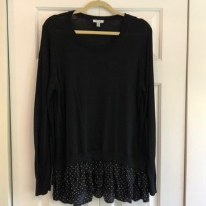 Black top with polka dot flounce